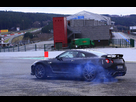 https://image.noelshack.com/fichiers/2012/18/1336136364-Nissan-GTR-noir-3-4-arriere-gauche-burn.jpg