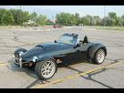 https://image.noelshack.com/fichiers/2013/43/1382832160-panoz-roadster.jpg