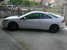 https://image.noelshack.com/fichiers/2014/33/1407961472-ford-cougar-1999-grey-metallic.jpg
