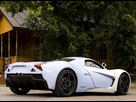 https://image.noelshack.com/fichiers/2015/37/1441915159-marussia-b1-arriere.jpg