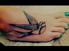 https://www.noelshack.com/2015-46-1447569334-tatouage-hirondelle-pied-delicate-accents-verts.jpg