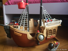 https://image.noelshack.com/fichiers/2016/27/1467674487-bateau-pirate-fisher-price.jpg