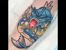 https://image.noelshack.com/fichiers/2016/36/1473545463-tatouage-pokemon.jpg