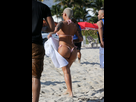https://image.noelshack.com/fichiers/2016/41/1476653692-amber-rose-in-bikini-at-a-beach-in-miami-14.jpg