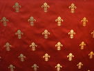 https://image.noelshack.com/fichiers/2017/14/1491517169-fleur-de-lys-fond-rouge.jpg