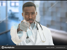 https://image.noelshack.com/minis/2018/10/6/1520694848-depositphotos-134616394-stock-photo-african-black-male-doctor-with.png