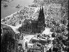 https://image.noelshack.com/fichiers/2019/16/1/1555358725-the-cologne-cathedral-stands-tall-amidst-the-ruins-of-the-city-after-allied-bombings-1944-1.jpg