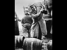 https://www.noelshack.com/2019-22-7-1559444256-a-us-federal-agent-broaching-a-beer-barrel-from-an-illegal-cargo-during-the-american-prohibition-era-american-school.jpg
