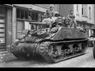 https://image.noelshack.com/fichiers/2020/53/4/1609369787-a-sherman-tank-of-8th-armoured-brigade-in-kevelaer-germany-4-march-1945-b15145-5ee92fd41e4040bab305638b2f6b8fcf.jpg