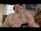 https://image.noelshack.com/fichiers/2021/01/7/1610311620-obese-gamer-joue-nu-sur-son-lit.jpg