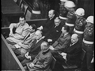 https://image.noelshack.com/fichiers/2021/29/1/1626712625-260px-defendants-in-the-dock-at-the-nuremberg-trials.jpg