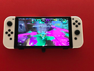 https://image.noelshack.com/fichiers/2021/37/6/1631987191-switch-oled-2.jpg