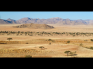 https://image.noelshack.com/fichiers/2022/13/2/1648590420-569731-1260x630-desert-de-kalahari-kalahari-namibie.jpg