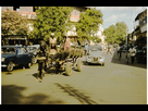 https://image.noelshack.com/fichiers/2022/16/4/1650545665-horse-drawn-cart-and-cars-on-street-in-bamako-1961.jpg