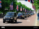 https://image.noelshack.com/fichiers/2022/19/4/1652387414-presidential-motorcade-of-uk-usa-security-guards-in-the-mall-during-c49m08.jpg