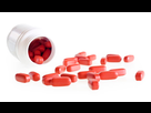 https://image.noelshack.com/fichiers/2022/21/1/1653311409-red-medication-pill-on-white-plastic-container.jpeg