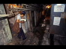 https://image.noelshack.com/fichiers/2022/32/5/1660324434-kowloon-walled-city-greg-girard-1989-22.jpg