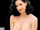 https://image.noelshack.com/fichiers/2022/41/4/1665683024-dita-von-teese-les-femmes-adorent-ses-strip-tease.jpg