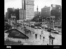 https://www.noelshack.com/2022-45-2-1667943727-cleveland-ohio-square-public-du-debut-des-annees-1950-fwycg6.jpg