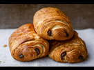 https://image.noelshack.com/fichiers/2023/51/4/1703189355-pain-au-chocolat-chocolatine-scaled.jpg