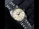 https://image.noelshack.com/fichiers/2023/51/6/1703360814-rolex-datejust-ref-16014-tapestry-dial-cream-n-7114xxx-0013-calque-8-1536x1536.jpg
