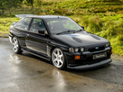 https://image.noelshack.com/minis/2024/04/1/1705946951-1992-ford-escort-rs-cosworth-black-featured-1.png