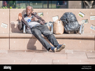 https://image.noelshack.com/fichiers/2024/20/4/1715858220-an-african-american-homeless-senior-citizen-male-sits-on-a-park-bench-in-pershing-square-in-los-angeles-and-gestures-with-his-right-hand-holding-his-r56k8x.jpg