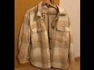 https://image.noelshack.com/fichiers/2024/21/1/1716218991-veste-beige.jpg