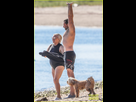 https://www.noelshack.com/2024-30-7-1722201983-hugh-jackman-goes-shirtless-day-at-beach-with-wife-deborra-lee-furness-52.jpg