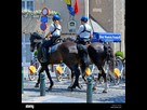 https://www.noelshack.com/2024-38-7-1727006337-les-agents-de-la-police-montee-a-cheval-patrouillant-a-bruxelles-belgique-dt1jka.jpg