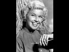 https://image.noelshack.com/fichiers/2024/39/3/1727289241-doris-day-1957.jpg