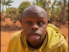 https://www.noelshack.com/2024-42-1-1728913622-portrait-homme-africain-chauve-adulte-syndrome-down-fond-foret-404612-375.jpg