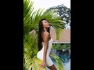 https://image.noelshack.com/fichiers/2024/42/3/1729057777-beautiful-asian-thai-woman-with-soft-smooth-clean-dark-tanned-skin-posing-outdoor-white-dress-with-tropical-background-830962-255.jpg