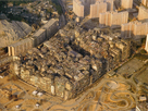 https://image.noelshack.com/fichiers/2024/43/6/1729897993-kowloon-walled-city-1989-aerial.jpg