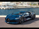 https://image.noelshack.com/fichiers/2025/05/6/1738438669-bugatti-divo-1.jpg