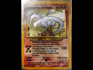 https://image.noelshack.com/fichiers/2026/16/4/1776316403-shiningcharizard-recto.jpg